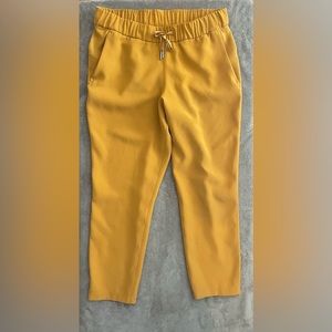 Lululemon On the Fly Jogger Pants Women Size 10 Marigold Pockets Drawstring